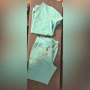 XS Catrina top S Zamora bottoms.